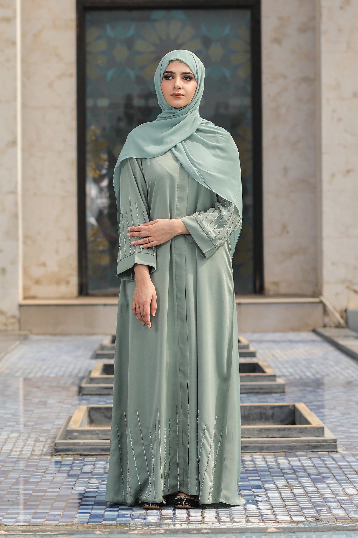 Beautiful front open mint gown maxi with hand-worked stone & pearl sleeves 