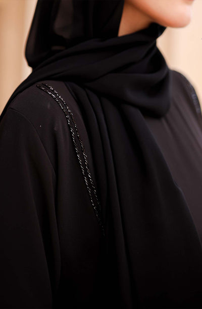 beautiful black color abaya with embellishment on shoulders