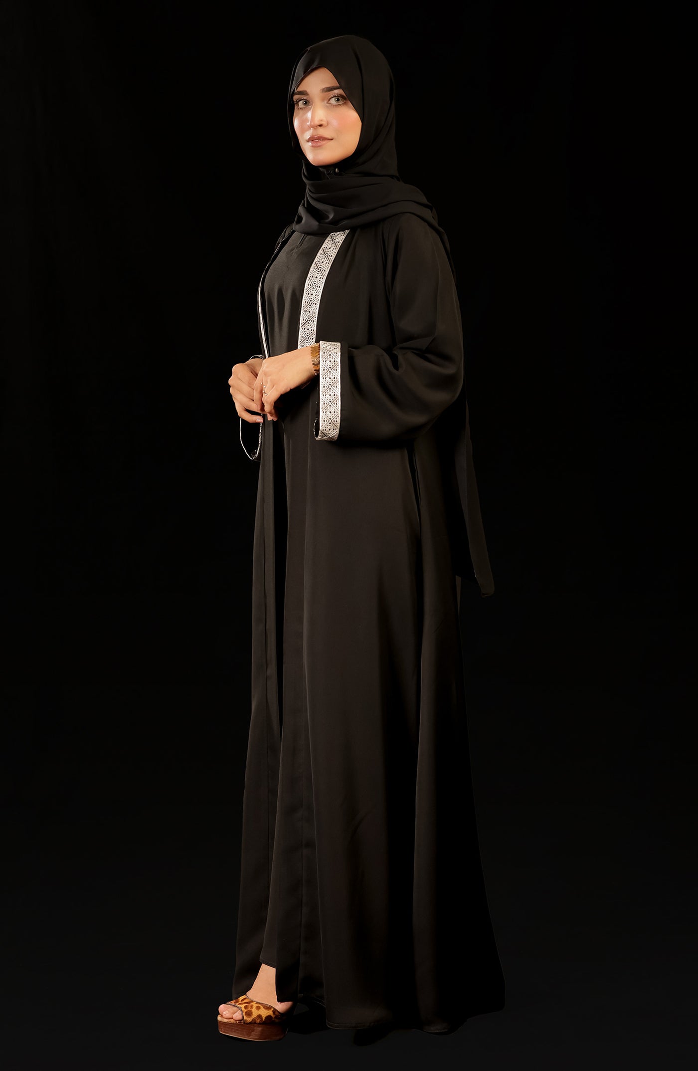 beautiful black open abaya with embroidered neckline and sleeves