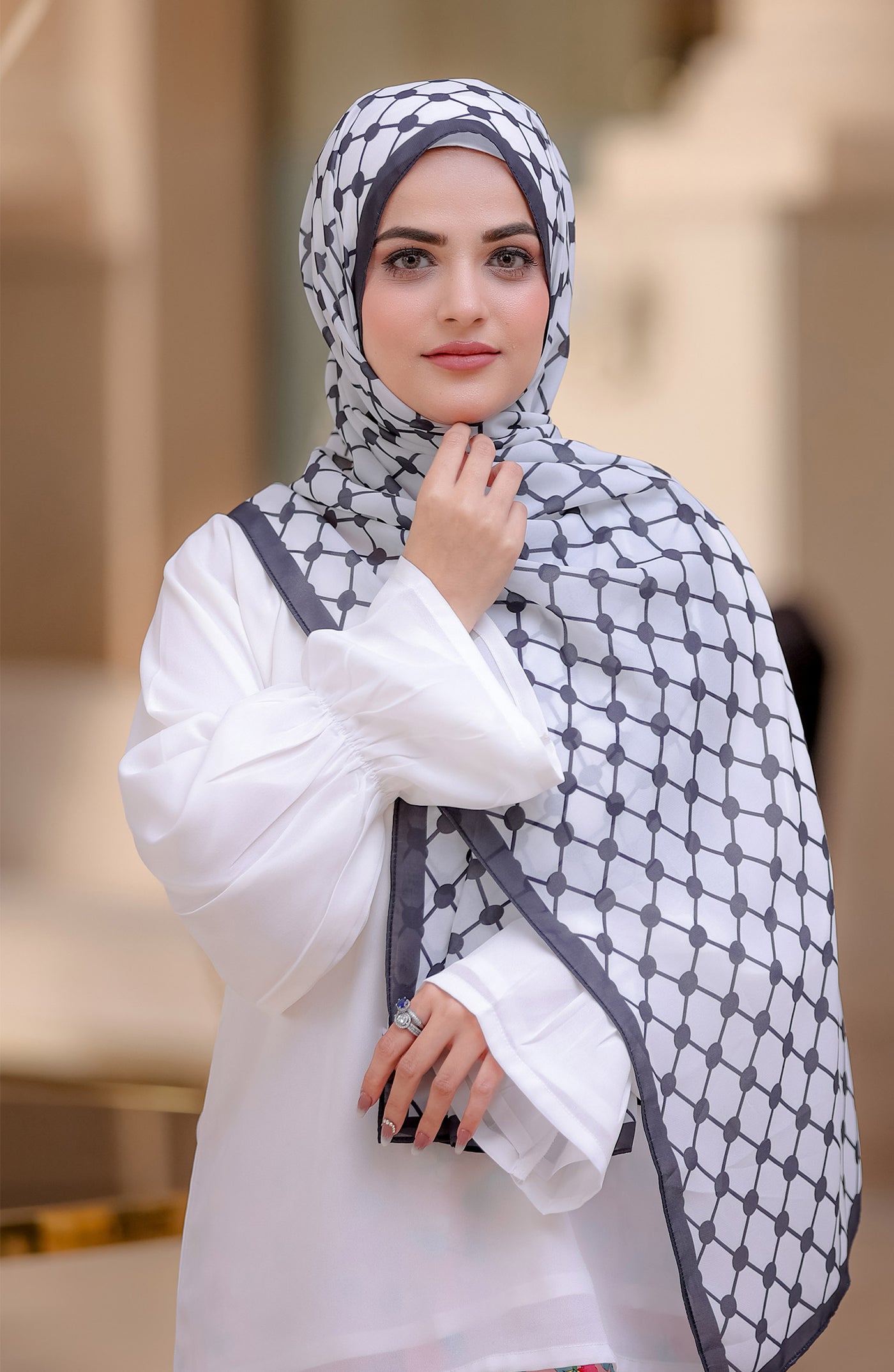 white palestine hijab in black patterns