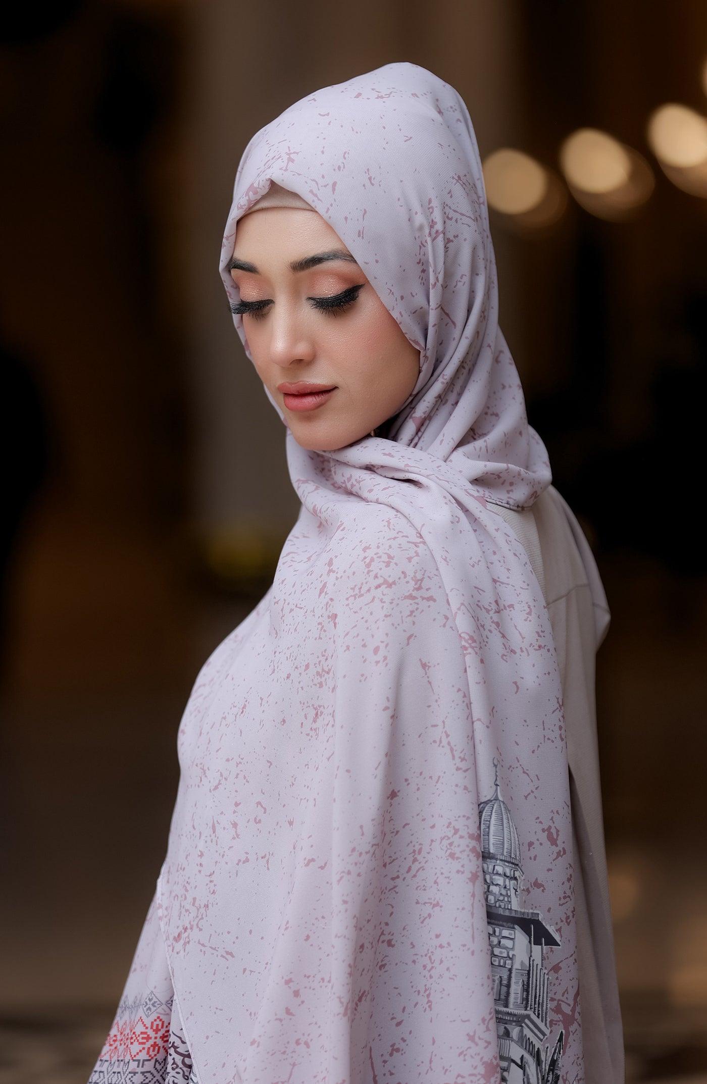 women with sand white palestine hijab