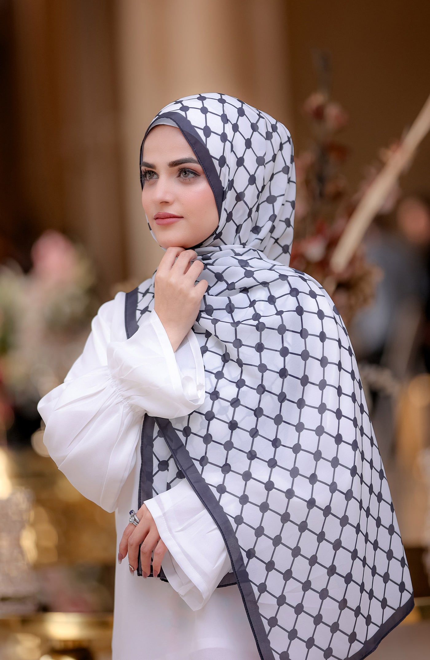 women with white palestine hijab
