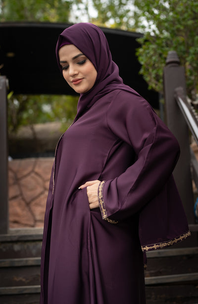  Analyzing image    embroidered abaya in raisin purple color