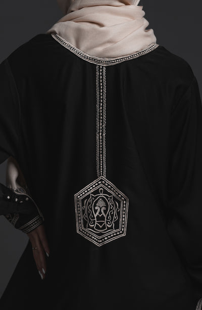 embroidered black abaya from back side