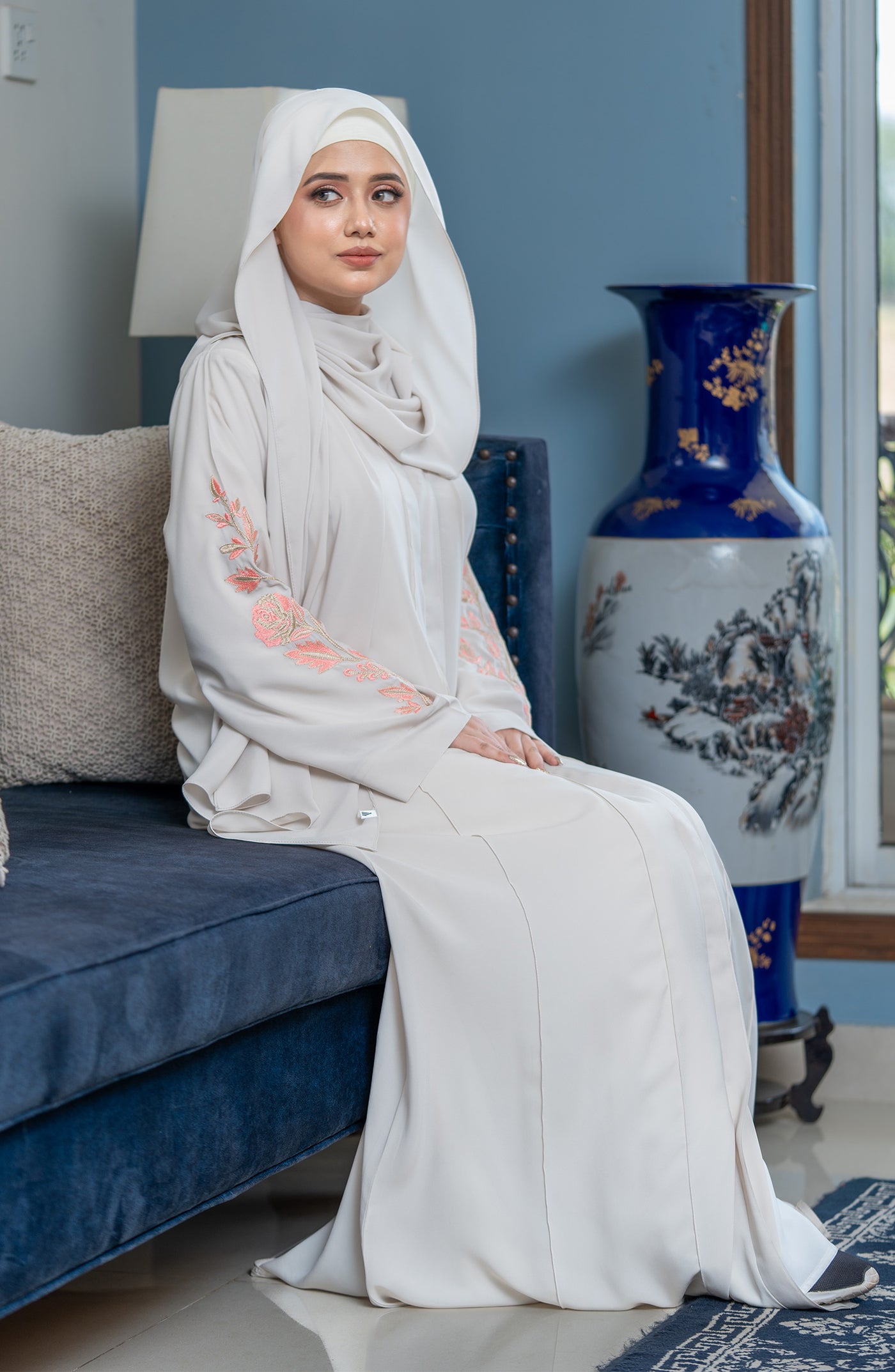ivory embroidered abaya with pin tucks on front panels