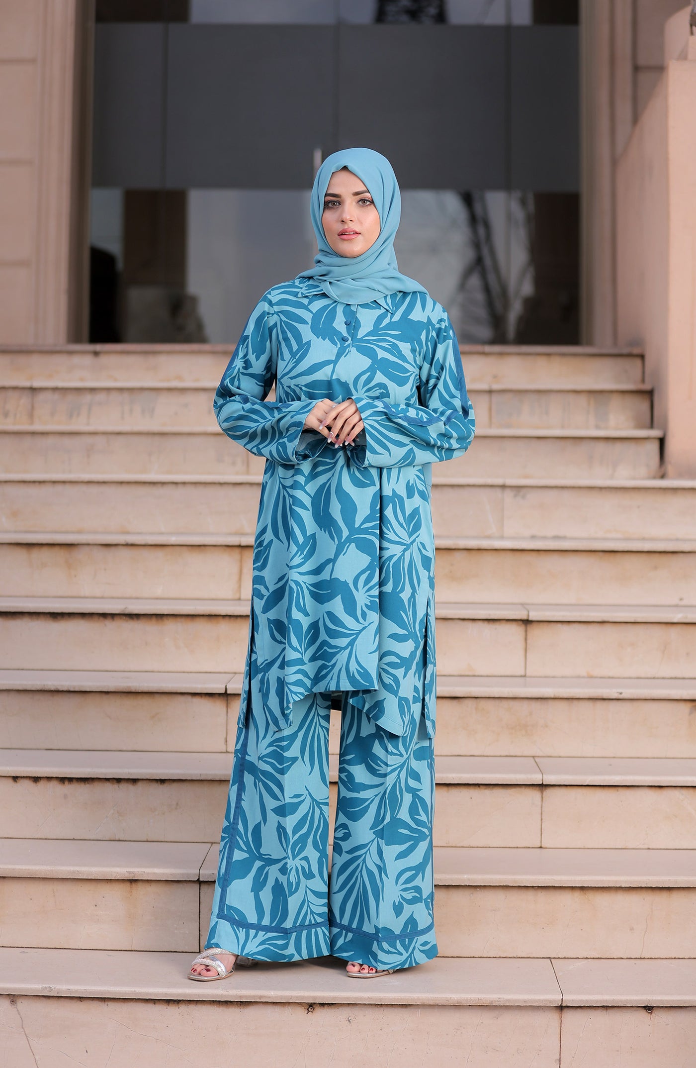 women in turquoise loungewear & hijab