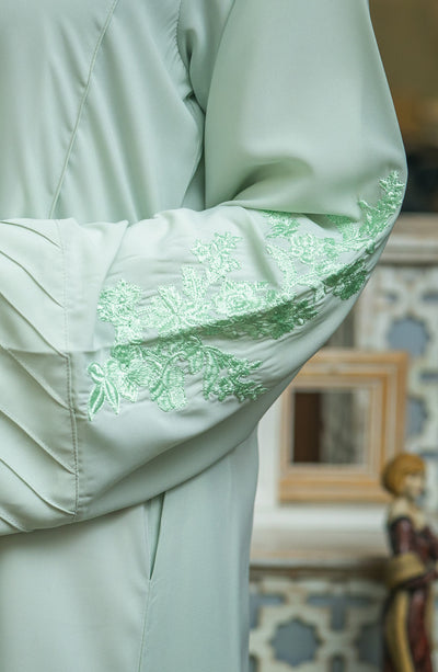 mint abaya with embroidered sleeves