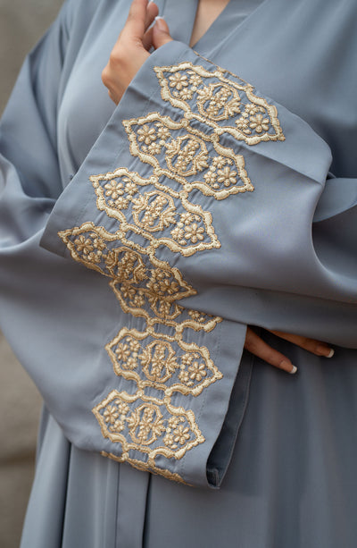 women sage green abaya with embroidery on sleeves