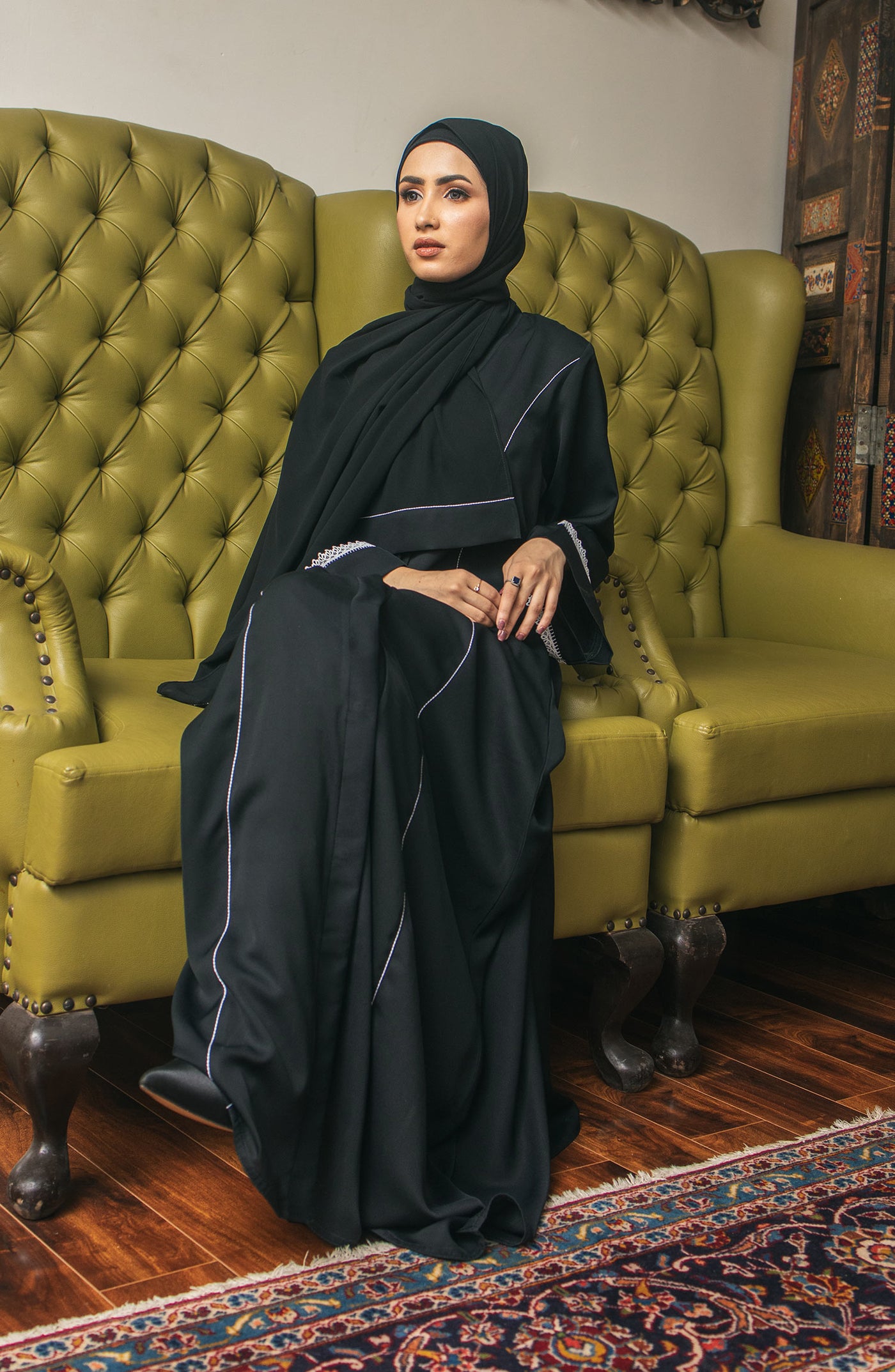 women with black lace abaya and balck chiffon hijab