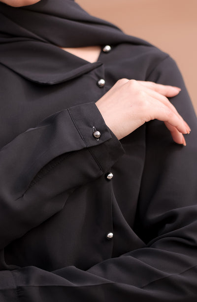 black top with buttons