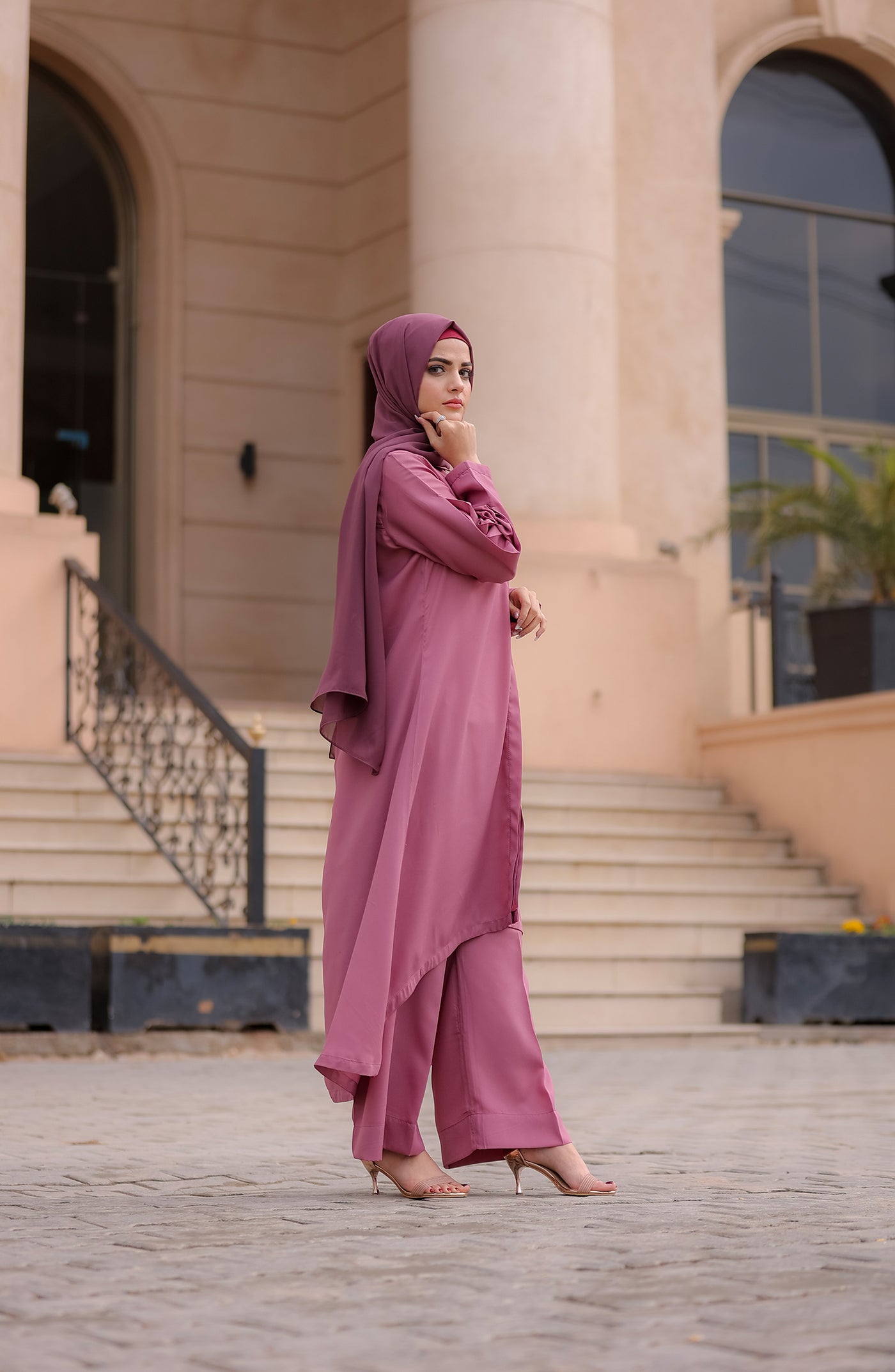 lady in long mauve co-ord set in pakistan