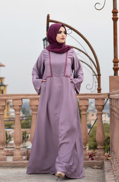 women with beautiful Rose Mauve abaya in pakistan