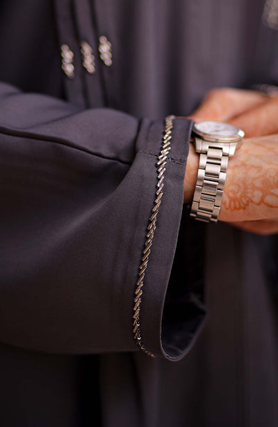 dark grey abaya with embellishment on sleeves