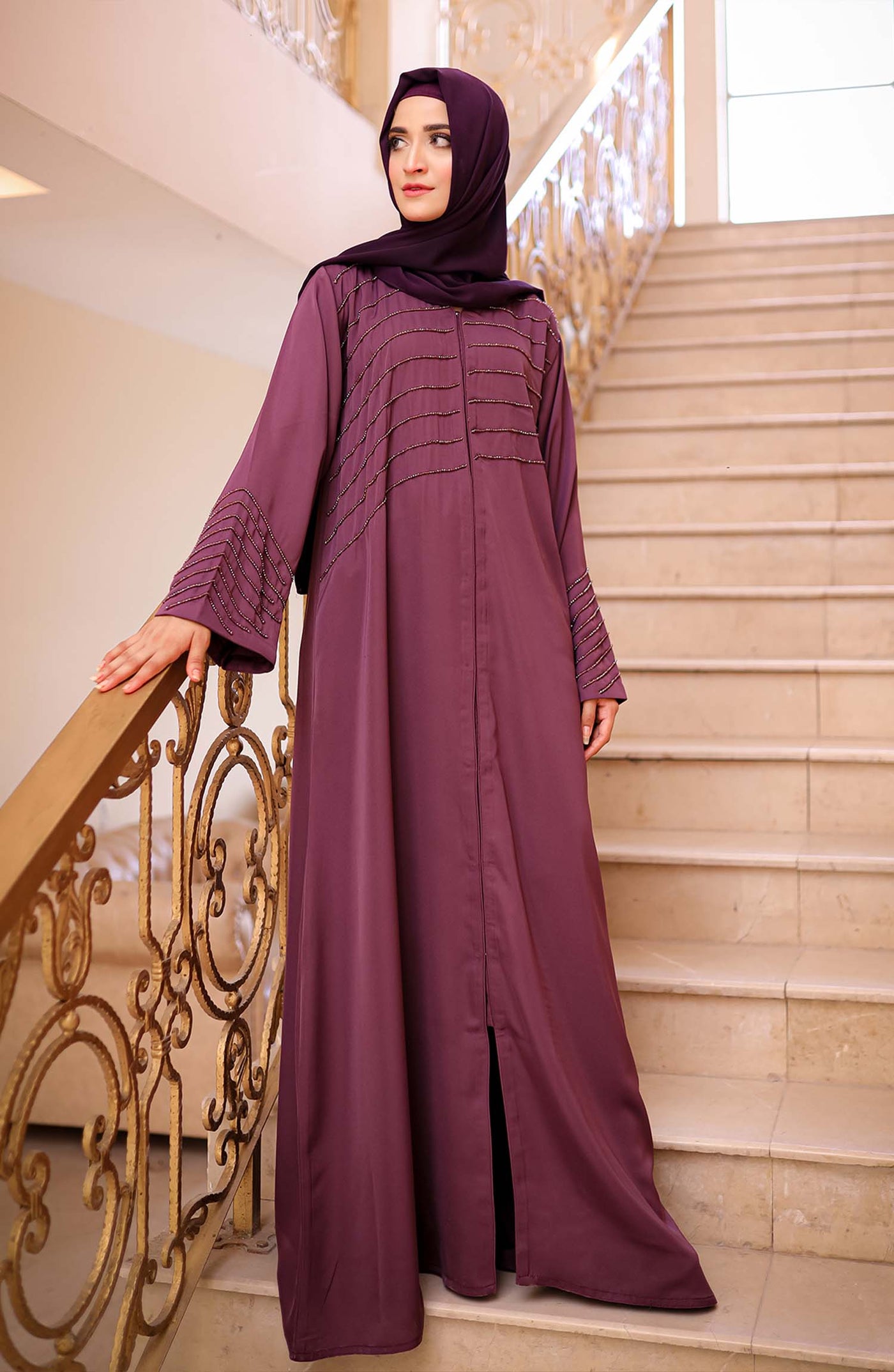 dark mauve abaya with embellishment on chest and sleeves